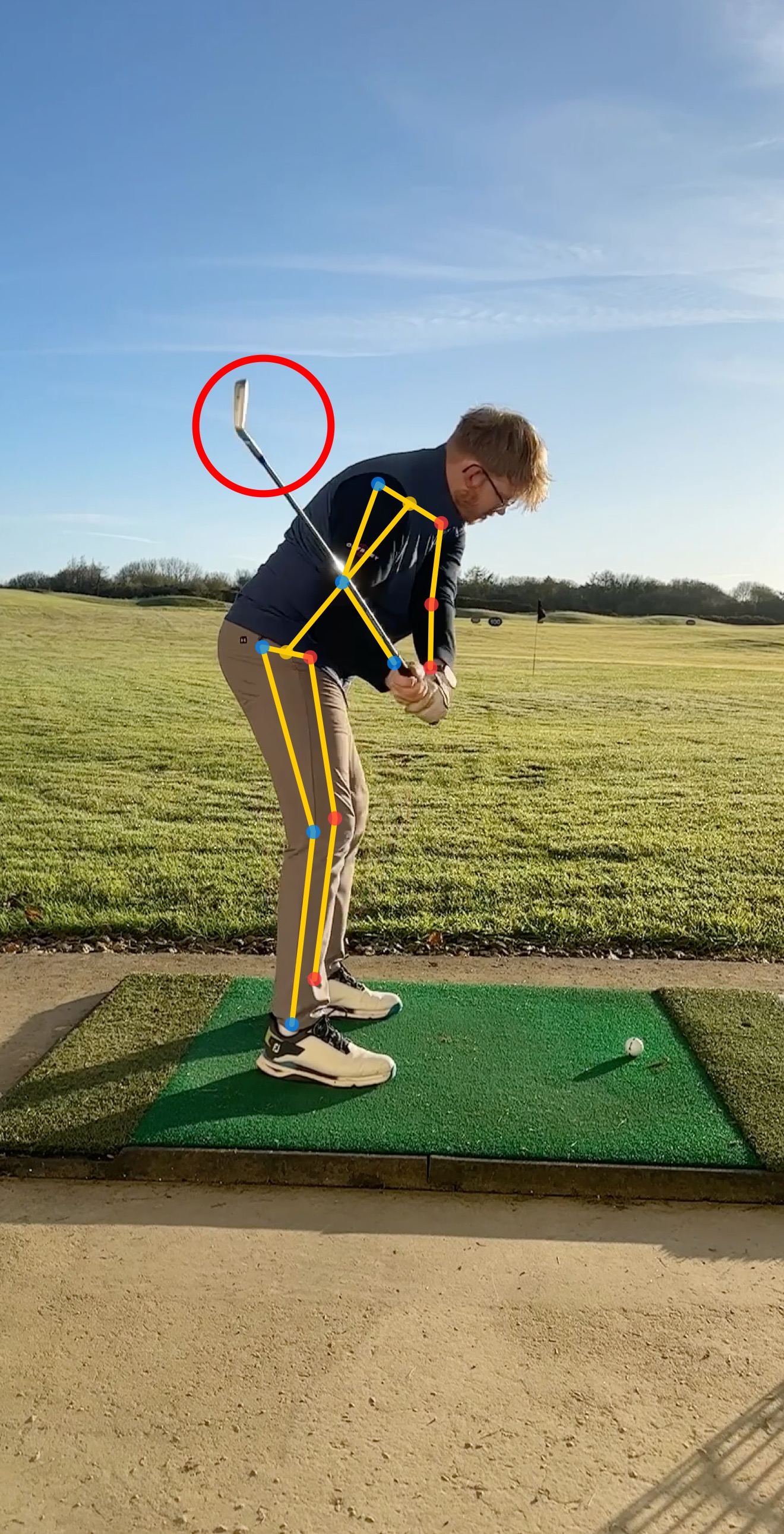 Swing analysis showing body mechanics and club position tracking during a golf lesson