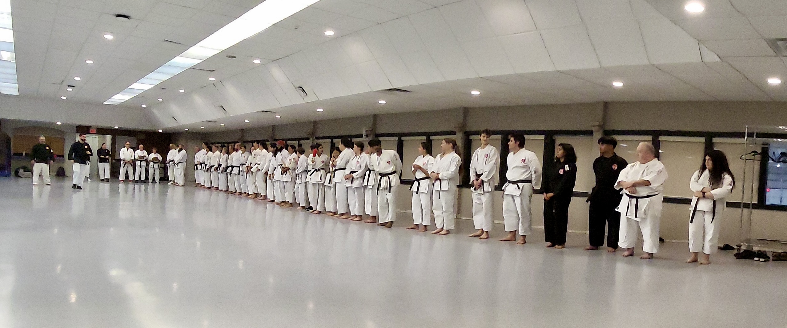 Milton Academy of Martial Arts students and instructors in white karate uniforms