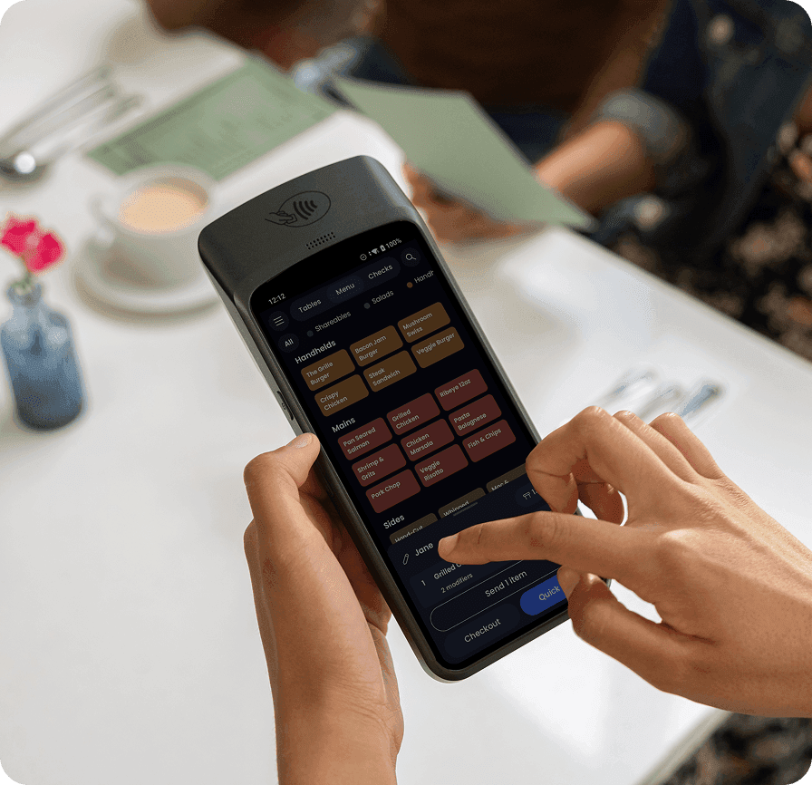 SpotOn handheld ordering device used tableside in a restaurant
