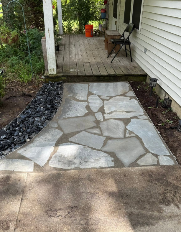 Walkway connecting to a patio in a West Michigan residential property