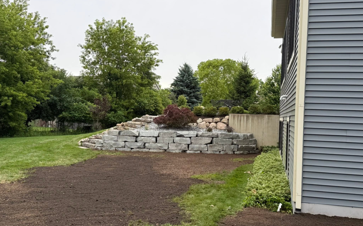 Walkway and retaining wall combination in a West Michigan residential property