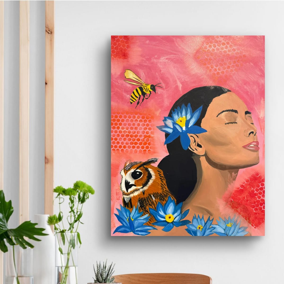 Woman with owl and blue flowers under pink honeycomb sky painting