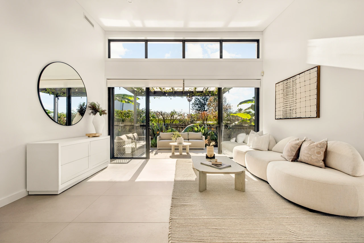 Light-filled living area with modern design and seamless indoor-outdoor flow in Hunters Hill.