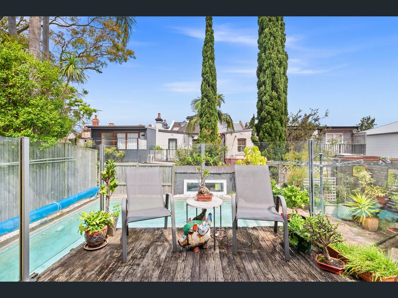 Birchgrove waterfront property with garden, patio, and harbour views.