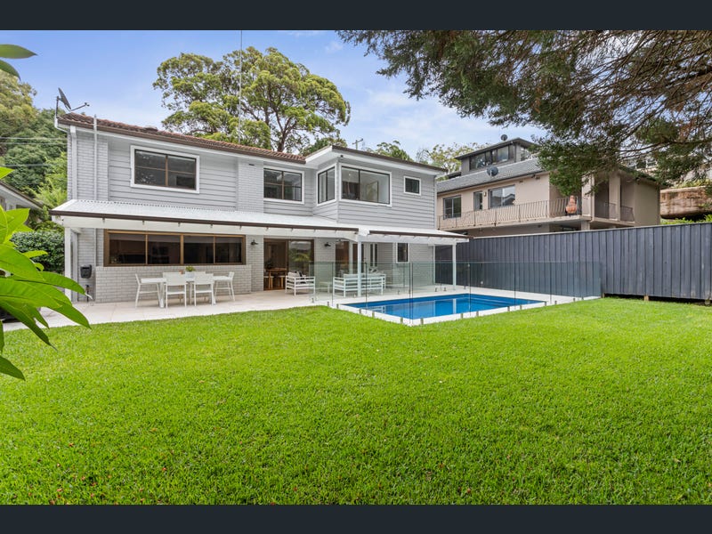 Luxury waterfront home in Tennyson Point with pool and river views.
