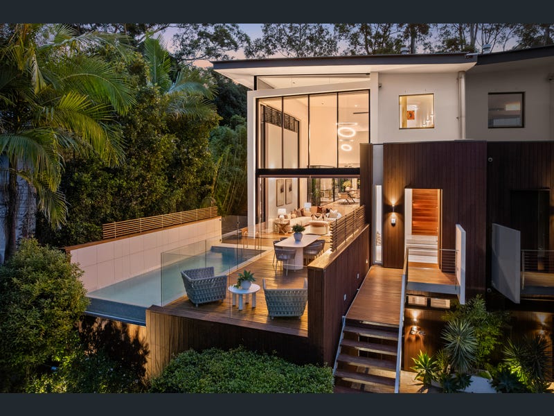 Modern Hunters Hill residence with waterfront pool and deck.