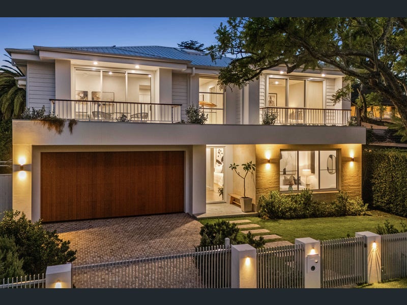 Elegant Balmain East residence with harbour views and modern architecture.