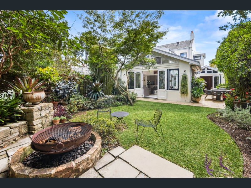Historic Woolwich home and garden with harbour views, appealing to buyers seeking maritime heritage.