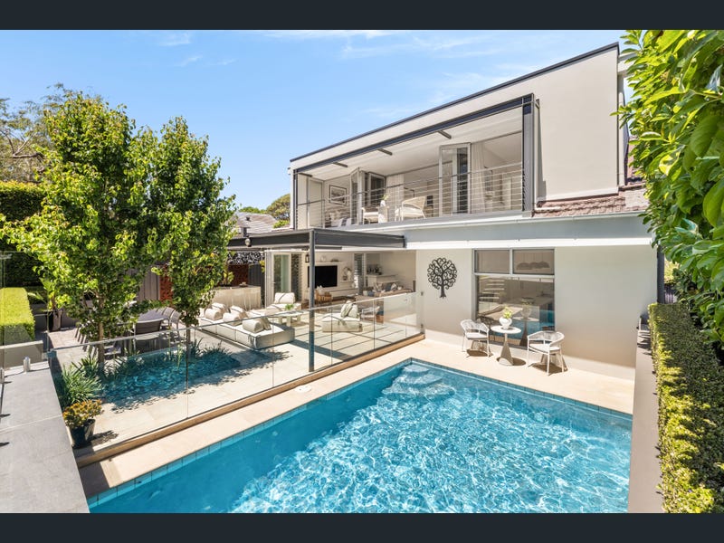 Exclusive Linley Point waterfront home with pool and city views.
