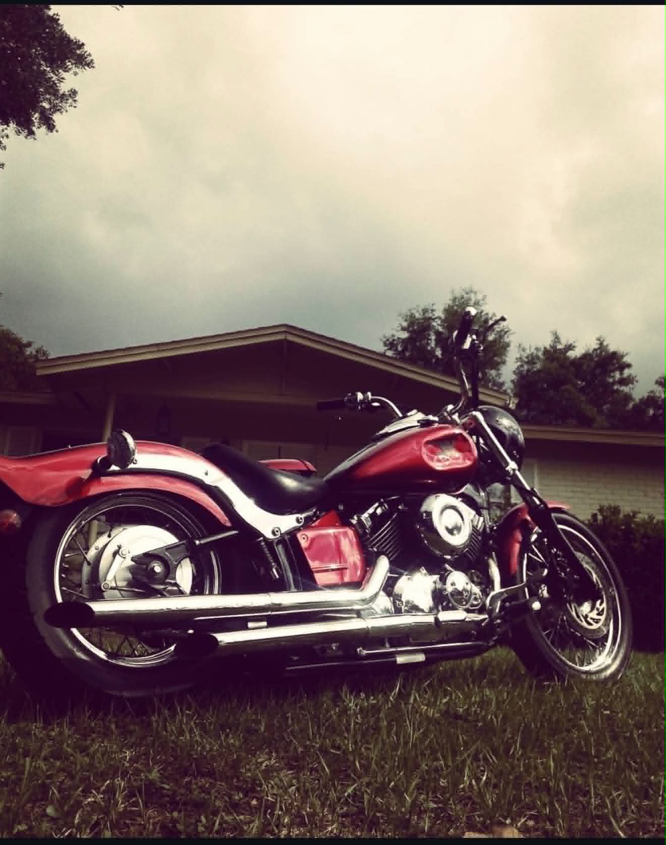 Custom red cruiser motorcycle with chrome details built by Marlito Motorcycles