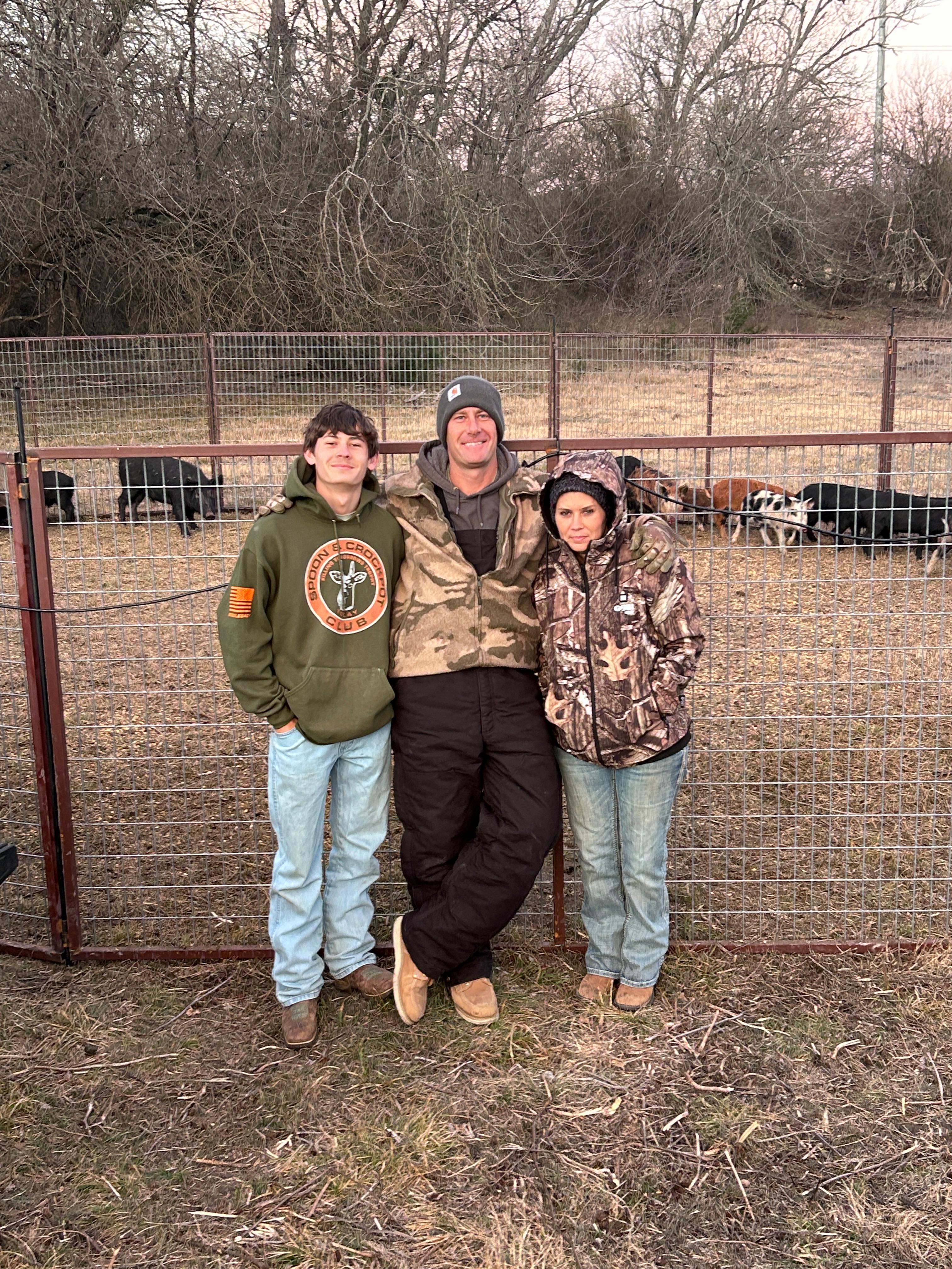 Happy landowners with Lone Star Wildlife team after successful wild boar removal on their ranch