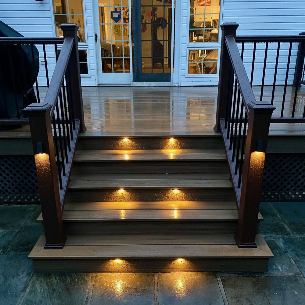 Custom composite deck stairs with integrated step riser lighting