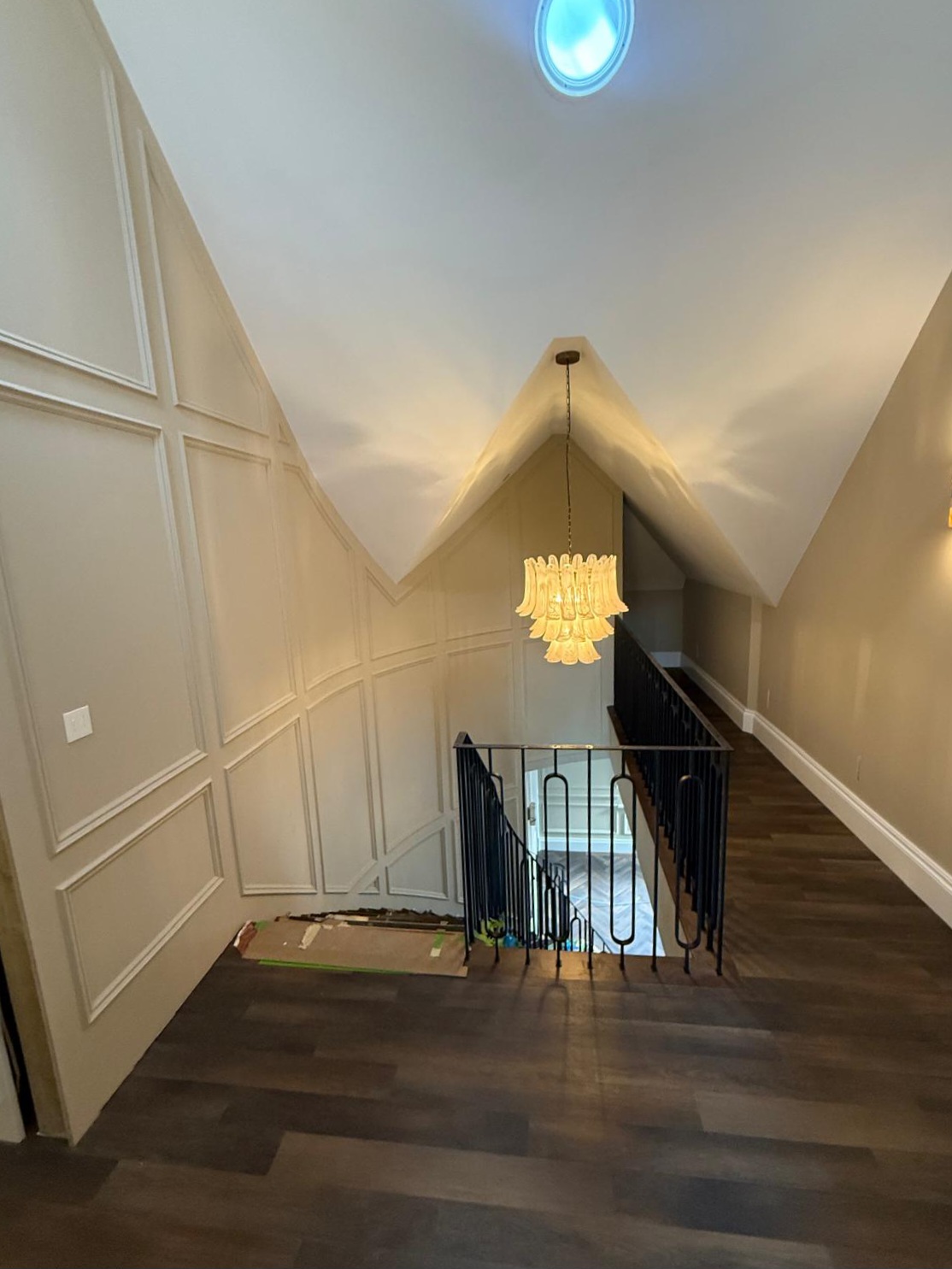 Paneled Hallway & Chandelier