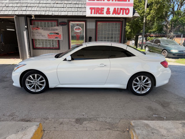 White Infiniti convertible with professionally tinted windows at Tinted by TK Bloomington IL