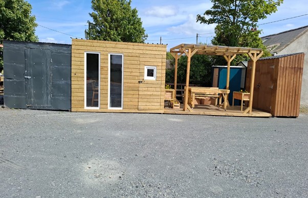 Garden pergola with Click Lock roofing and all-weather decking on display at Carlingford-Cabins.ie, Lordship, Co. Louth