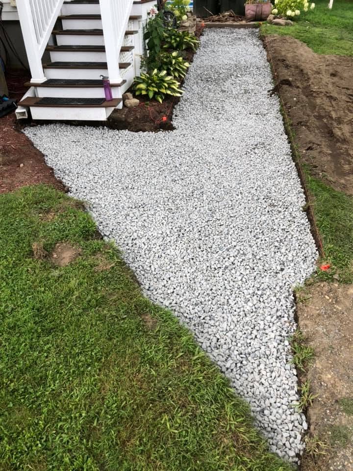 Paver or walkway project by Handy Lou's — crushed stone walkway with deck stairs