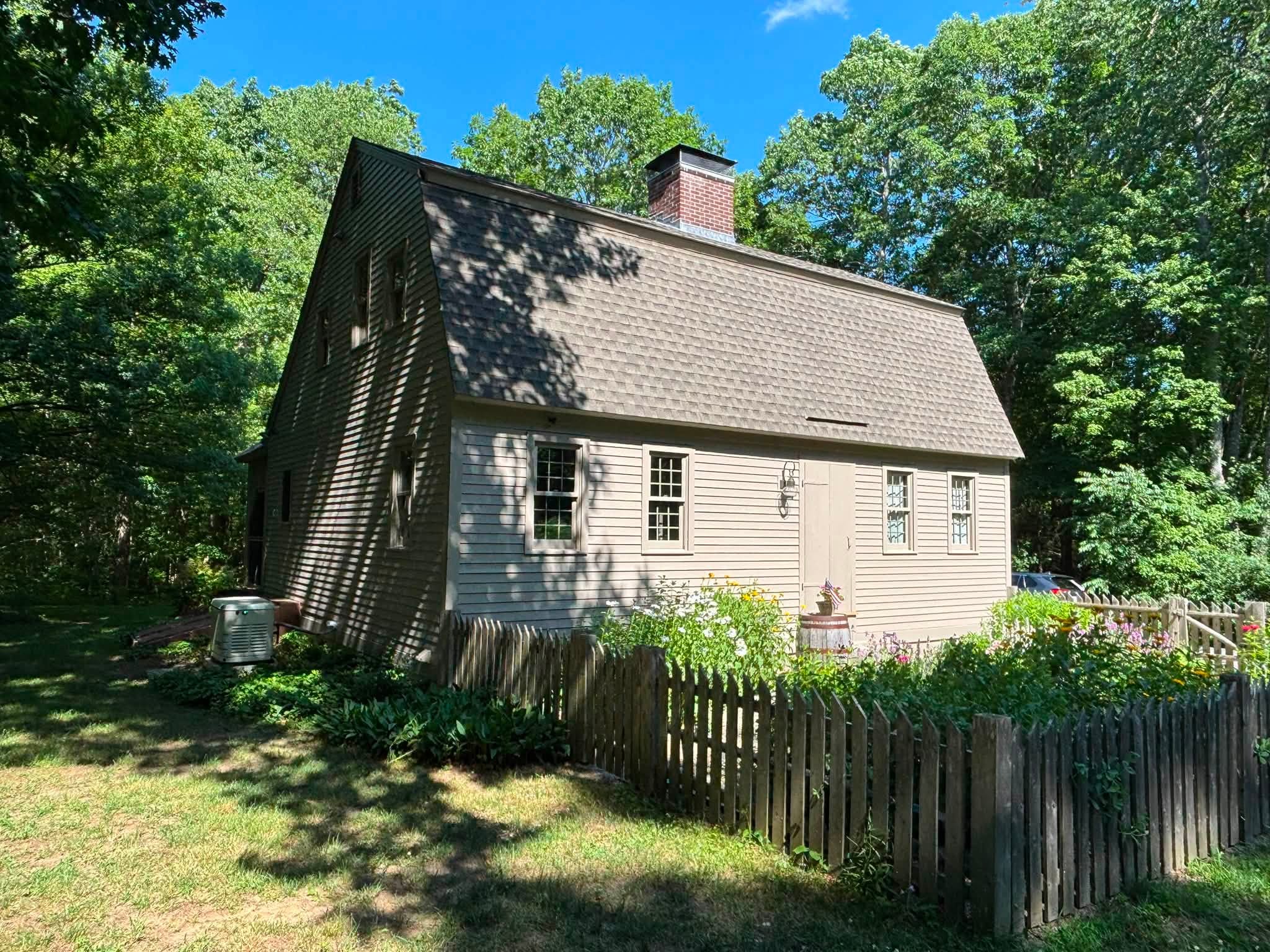 Painting project by Handy Lou's — gray gambrel colonial