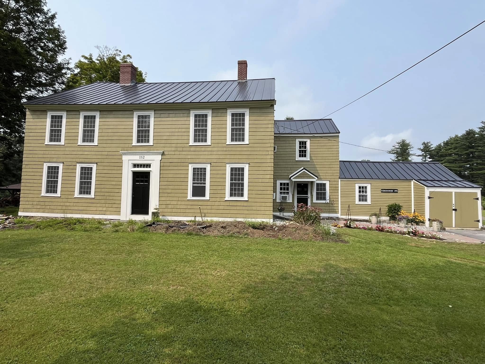Painting project by Handy Lou's — large two-story olive colonial