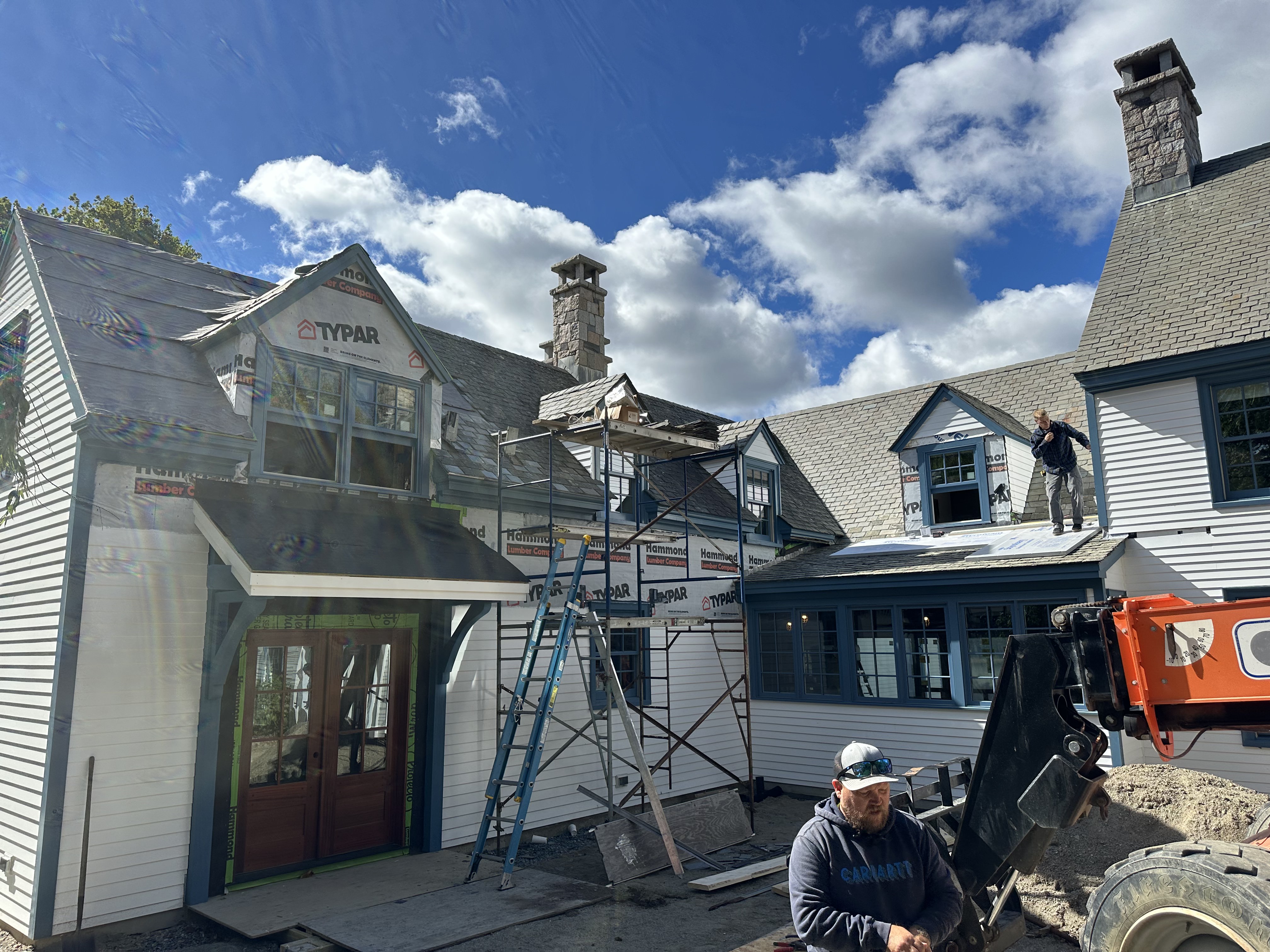 Full home renovation with new slate roofing and dormer windows