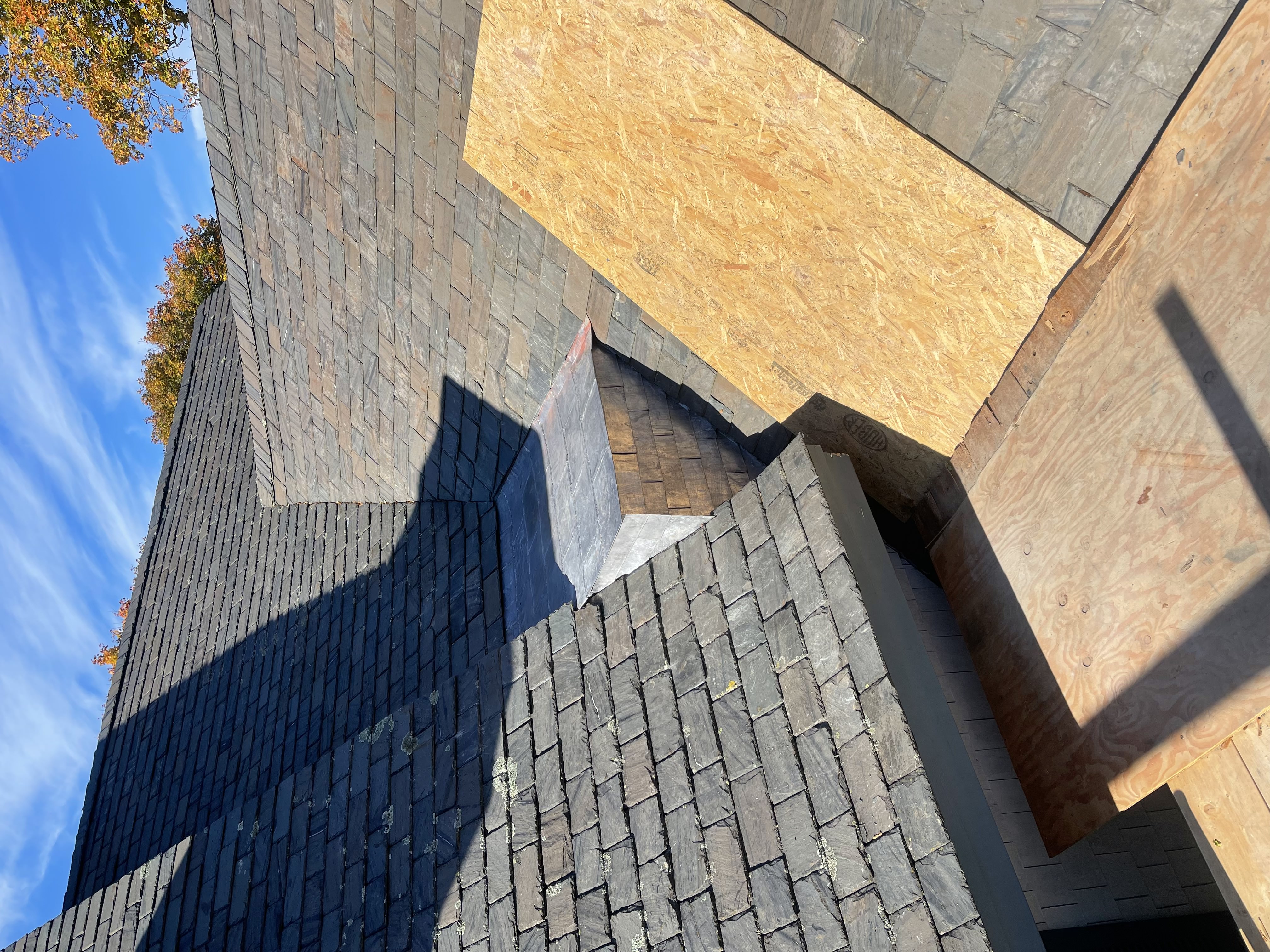 Slate roof valley and chimney flashing work
