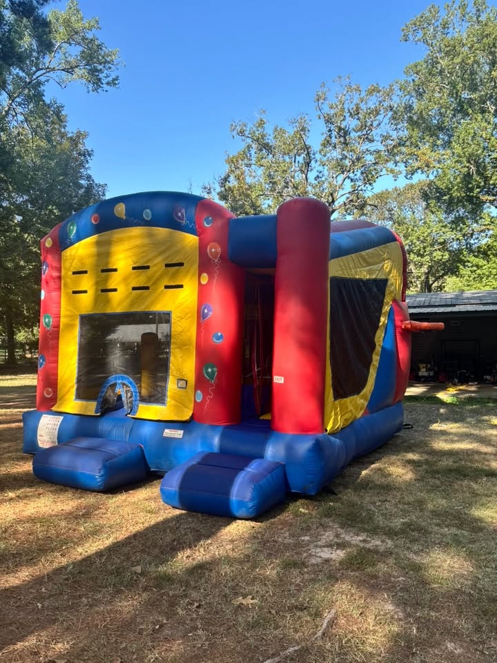 XL bounce house and slide combo at a customer party