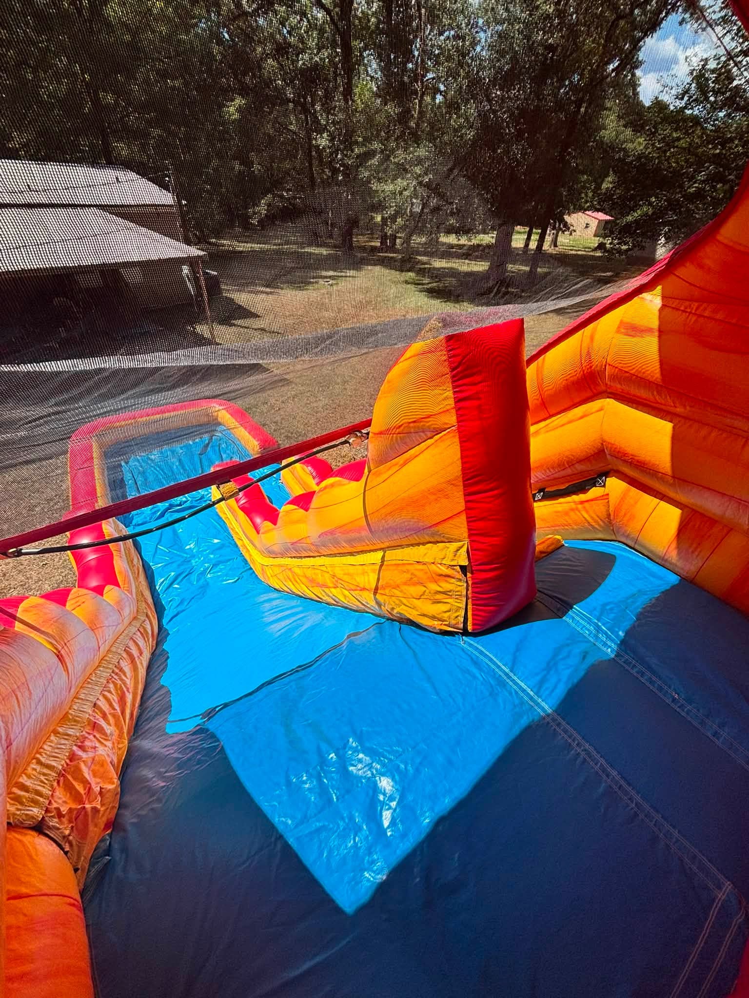Lava Lane waterslide full view at a backyard party
