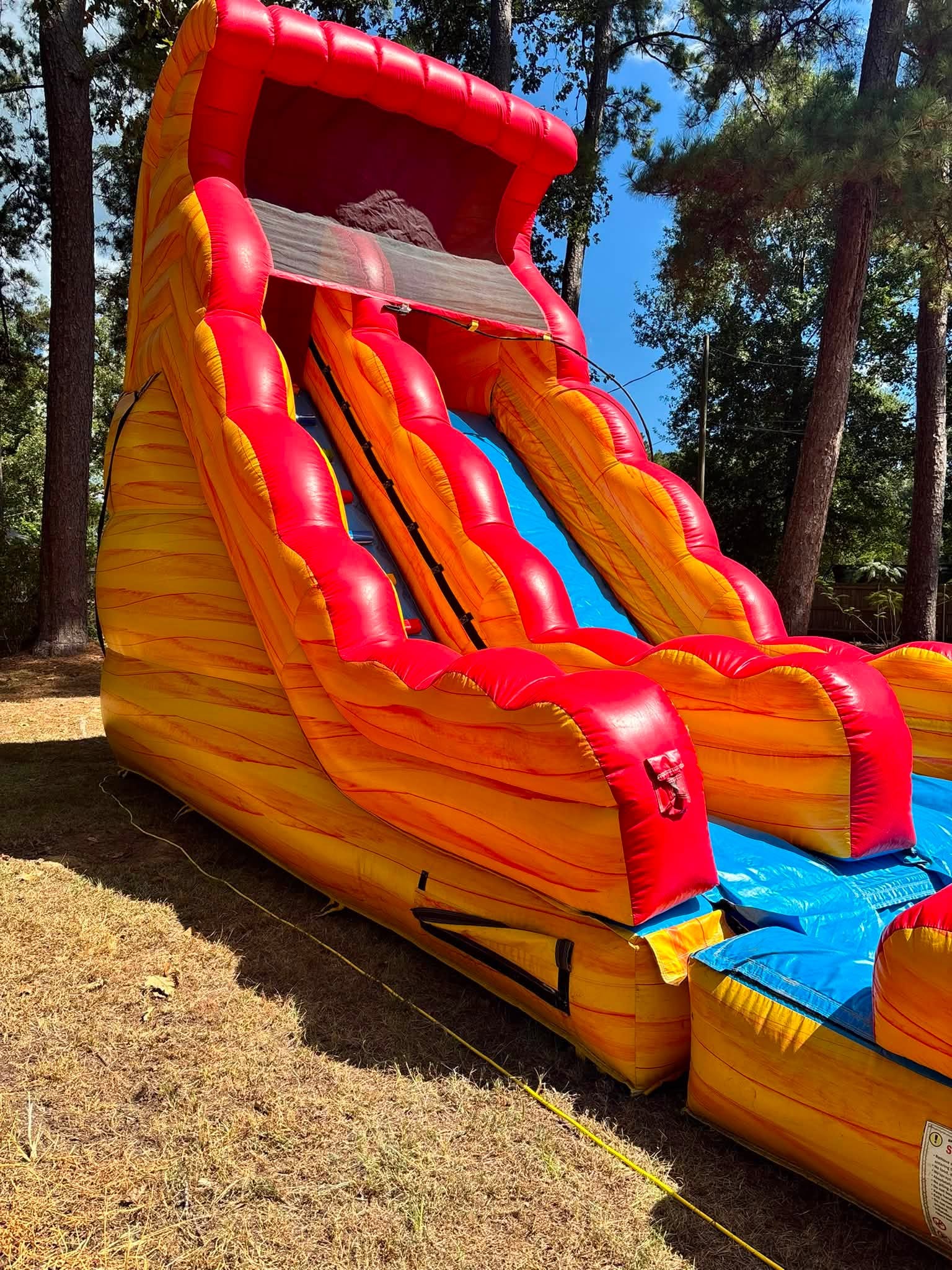 Kids sliding down the Lava Lane waterslide