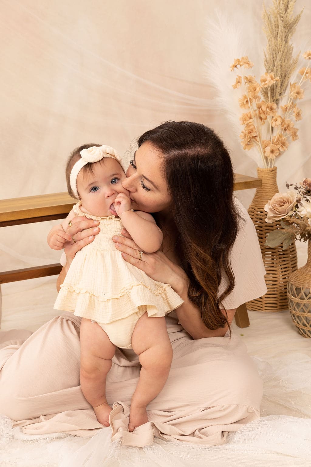 Close-up mother and baby portrait by Brooke Lazzarini
