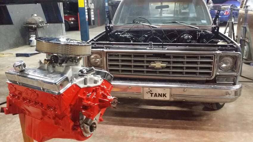 Chevrolet pickup with red engine block ready for installation at The Austin Diesel Specialists