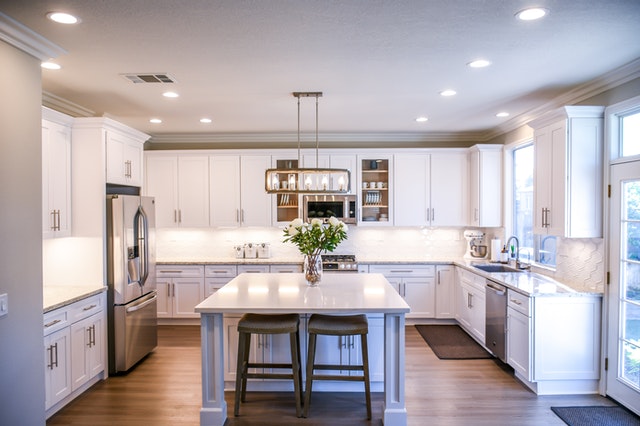 Gourmet Kitchen Island with Hardwood Floors