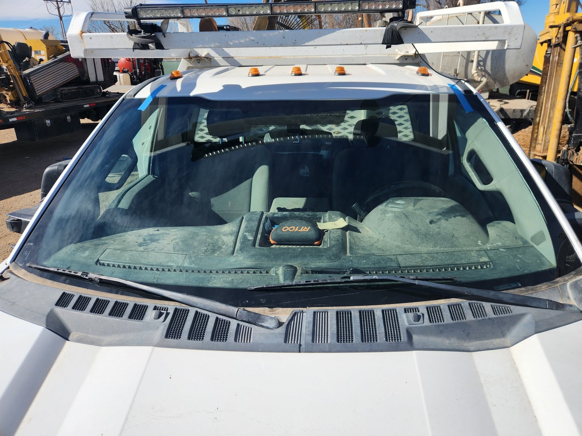 Semi truck cab with completed windshield replacement showing pristine glass installation