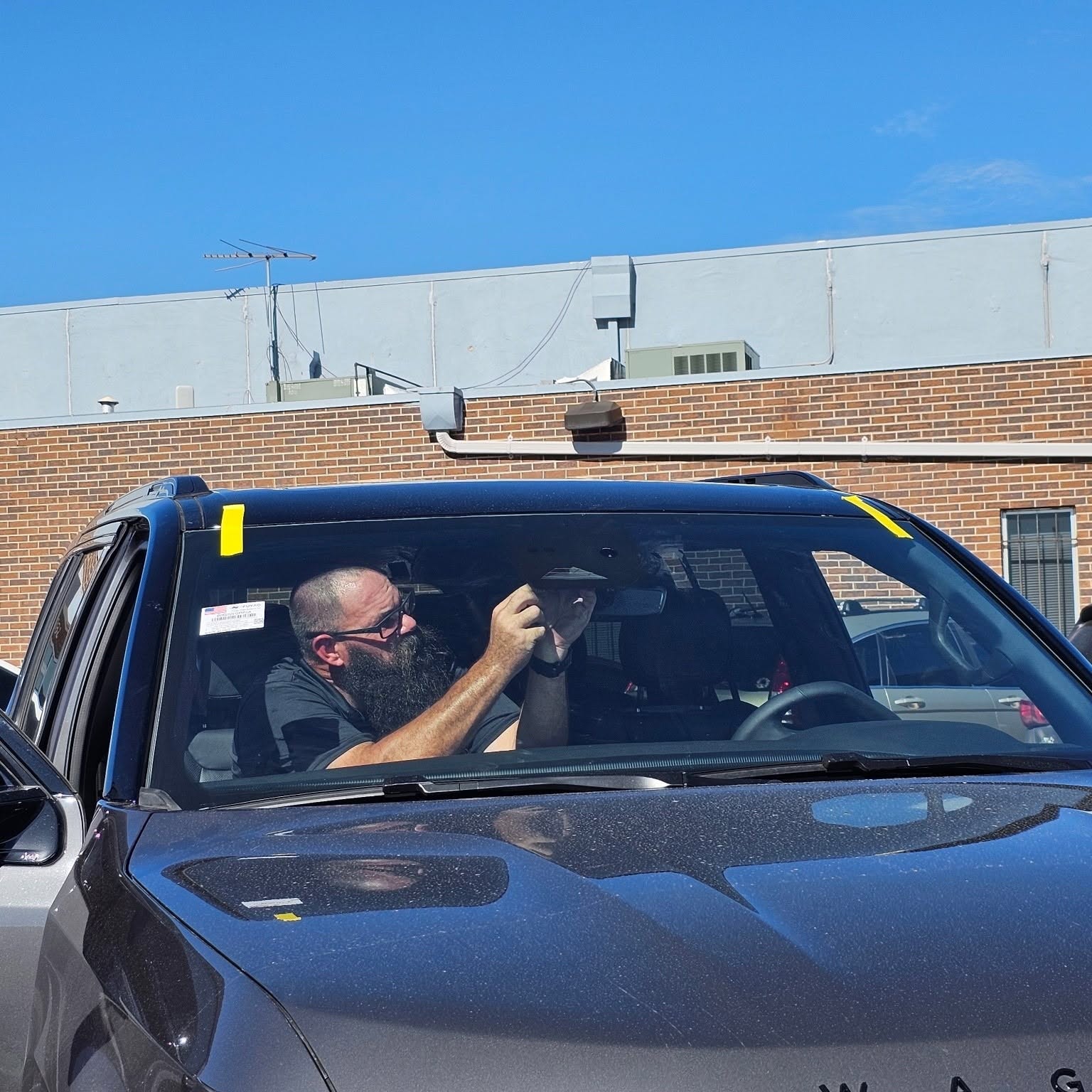 Eagle Eye Autoglass technician performing mobile windshield replacement