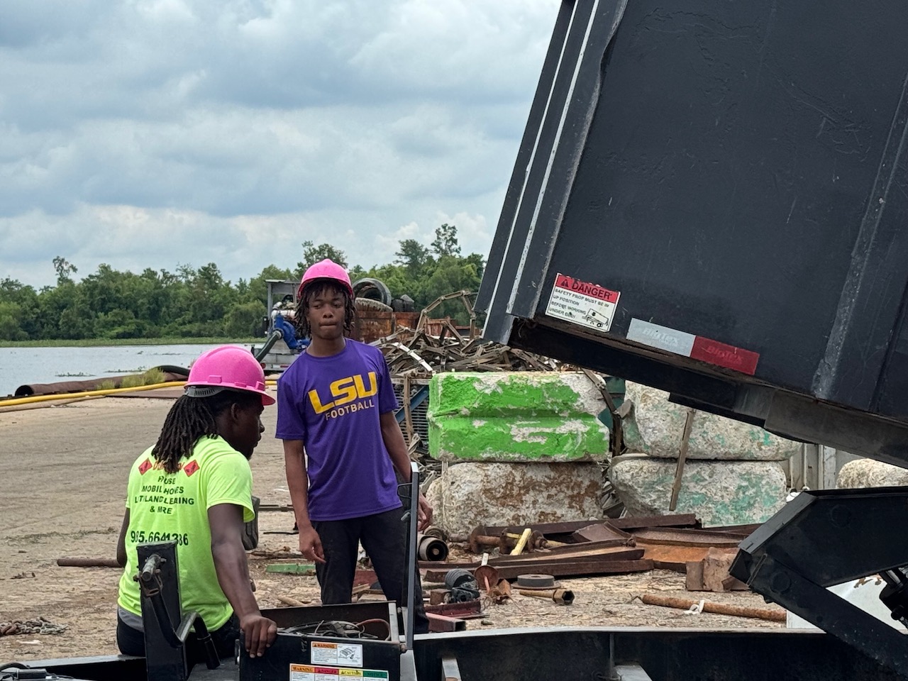 Team members coordinating at a scrap and recycling facility in Louisiana