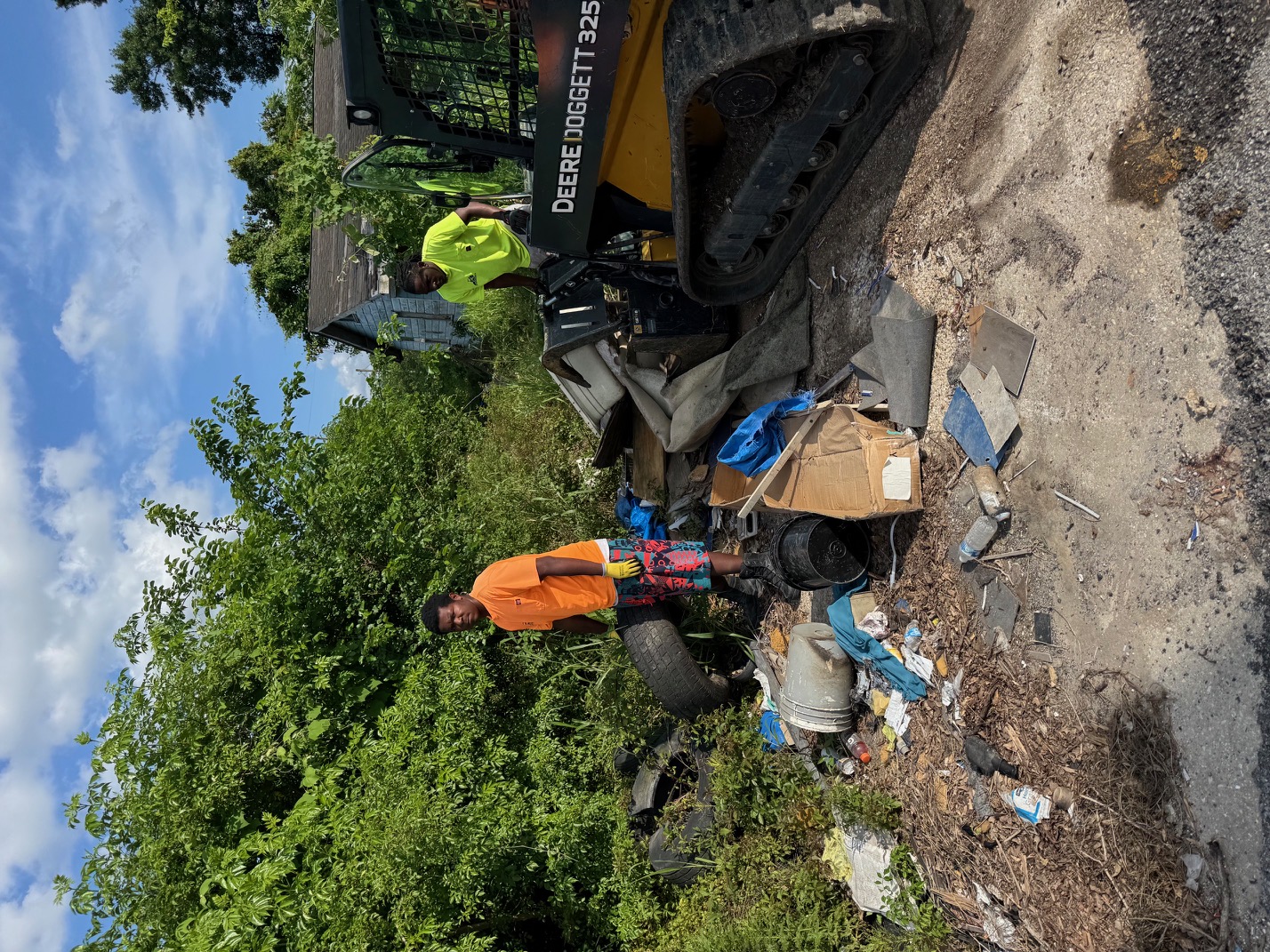 28 Blue Construction crew cleaning up debris and junk from a Louisiana property