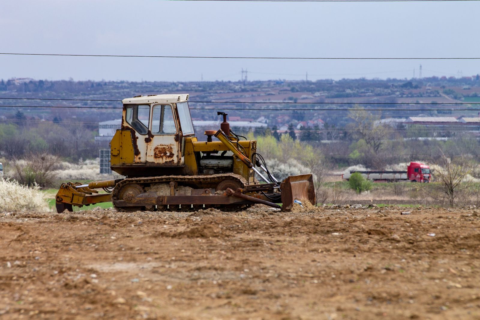 Bulldozer grading a field — construction equipment financing in California