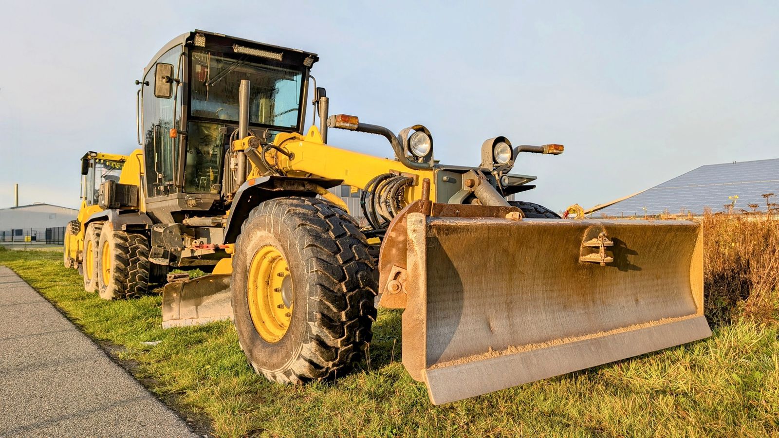 Heavy construction equipment working at a building site — construction equipment financing for contractors
