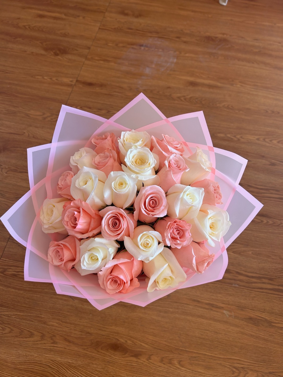 Elegant 25-rose soft pink and white Ecuadorian rose bouquet with delicate pink geometric paper wrap - romantic pastel arrangement by FridAndre Florals