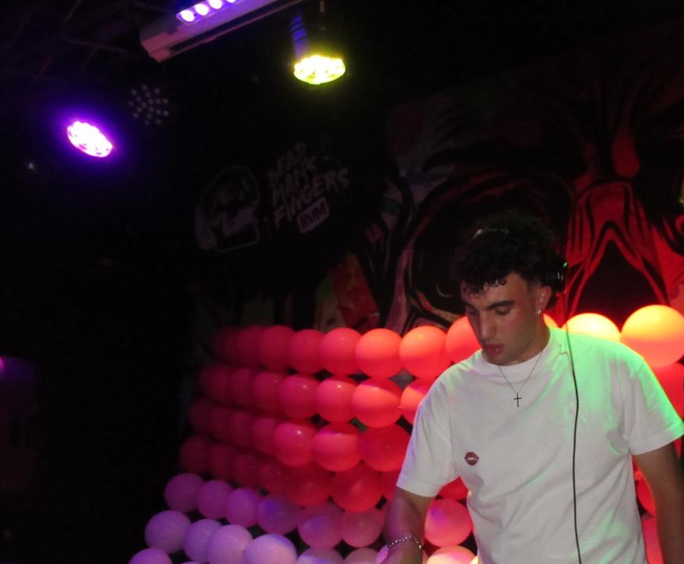 DJ White T performing live at event