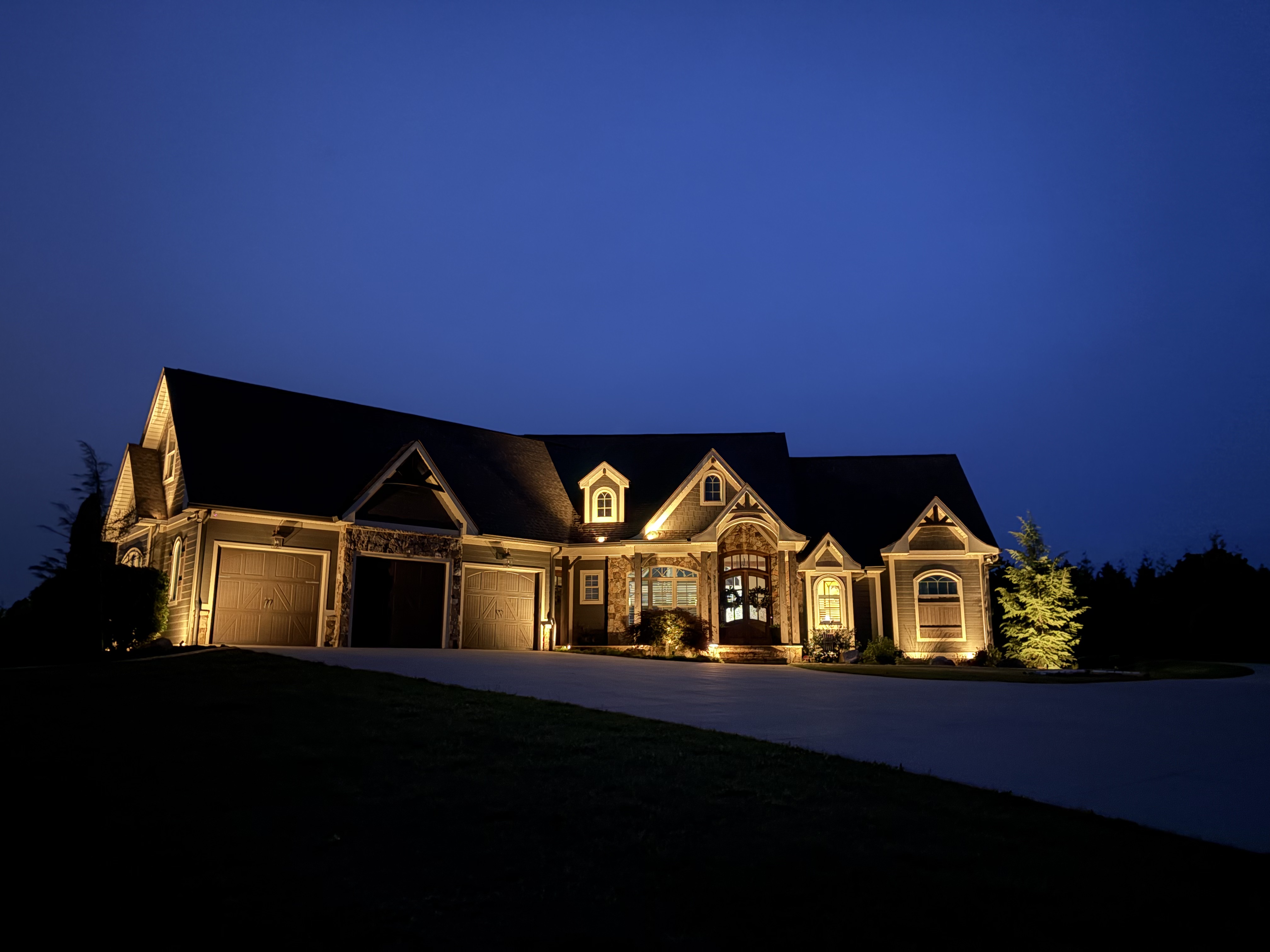 Twilight architectural uplighting on Upstate SC home