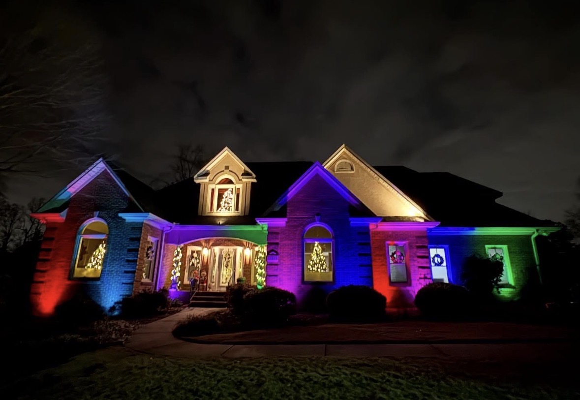 Smart color-changing RGB landscape lighting system on modern residence in Upstate SC