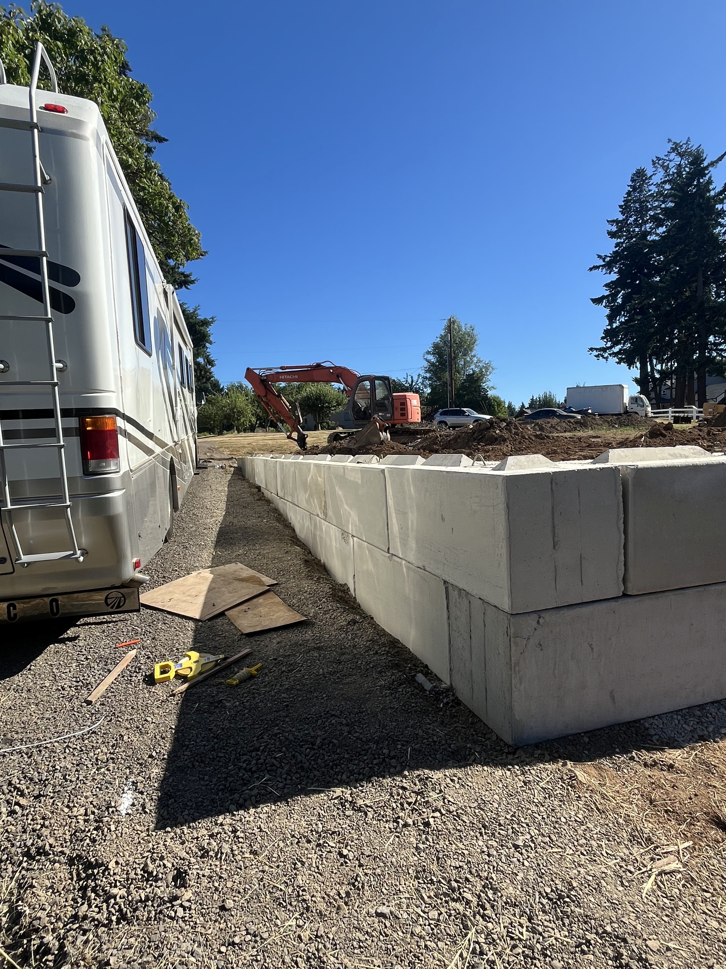 Excavation — Concrete block retaining wall & RV access lane excavation — representative project image