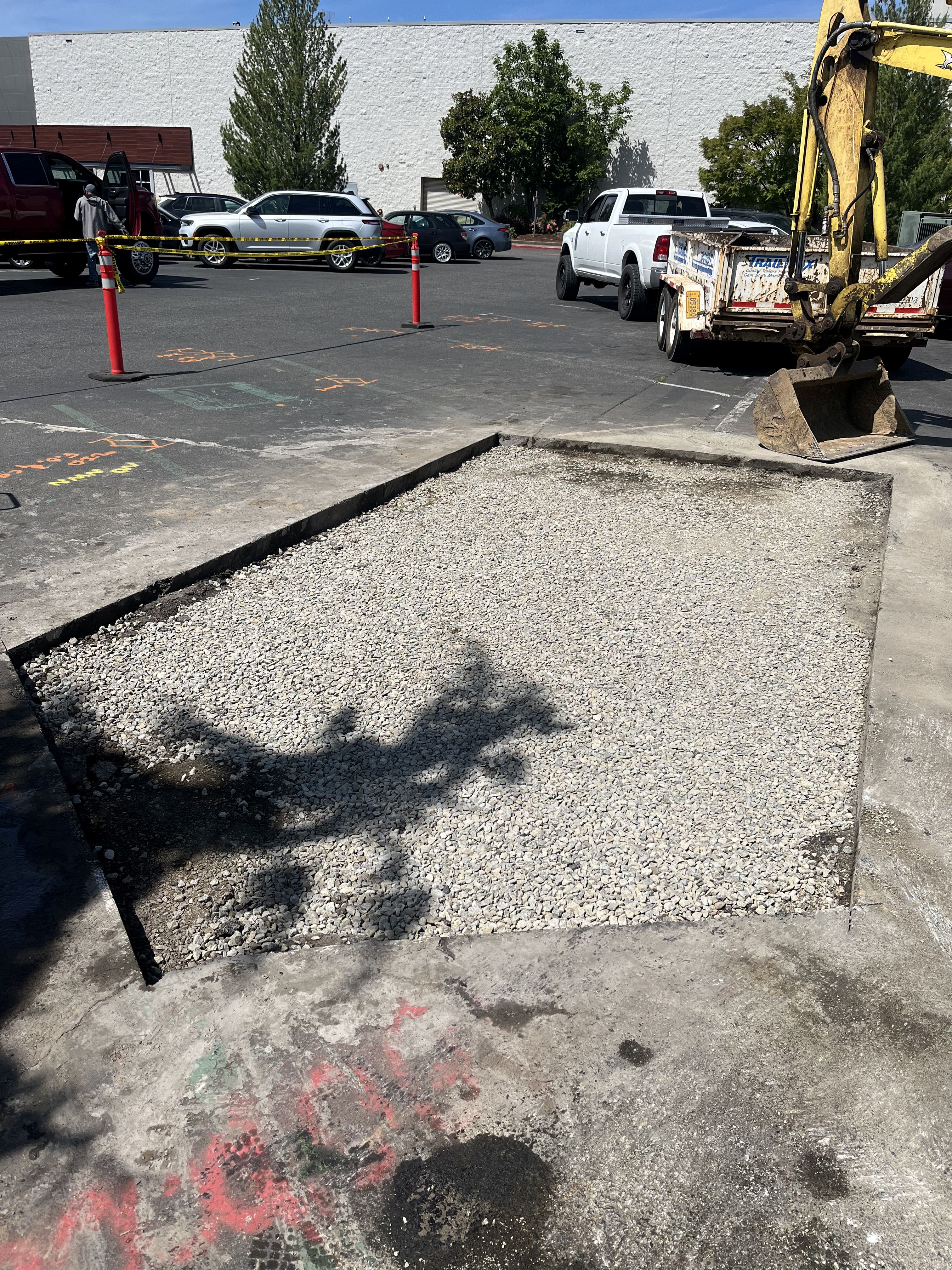 Excavation — Commercial parking lot saw cut & crushed rock base prep — representative project image