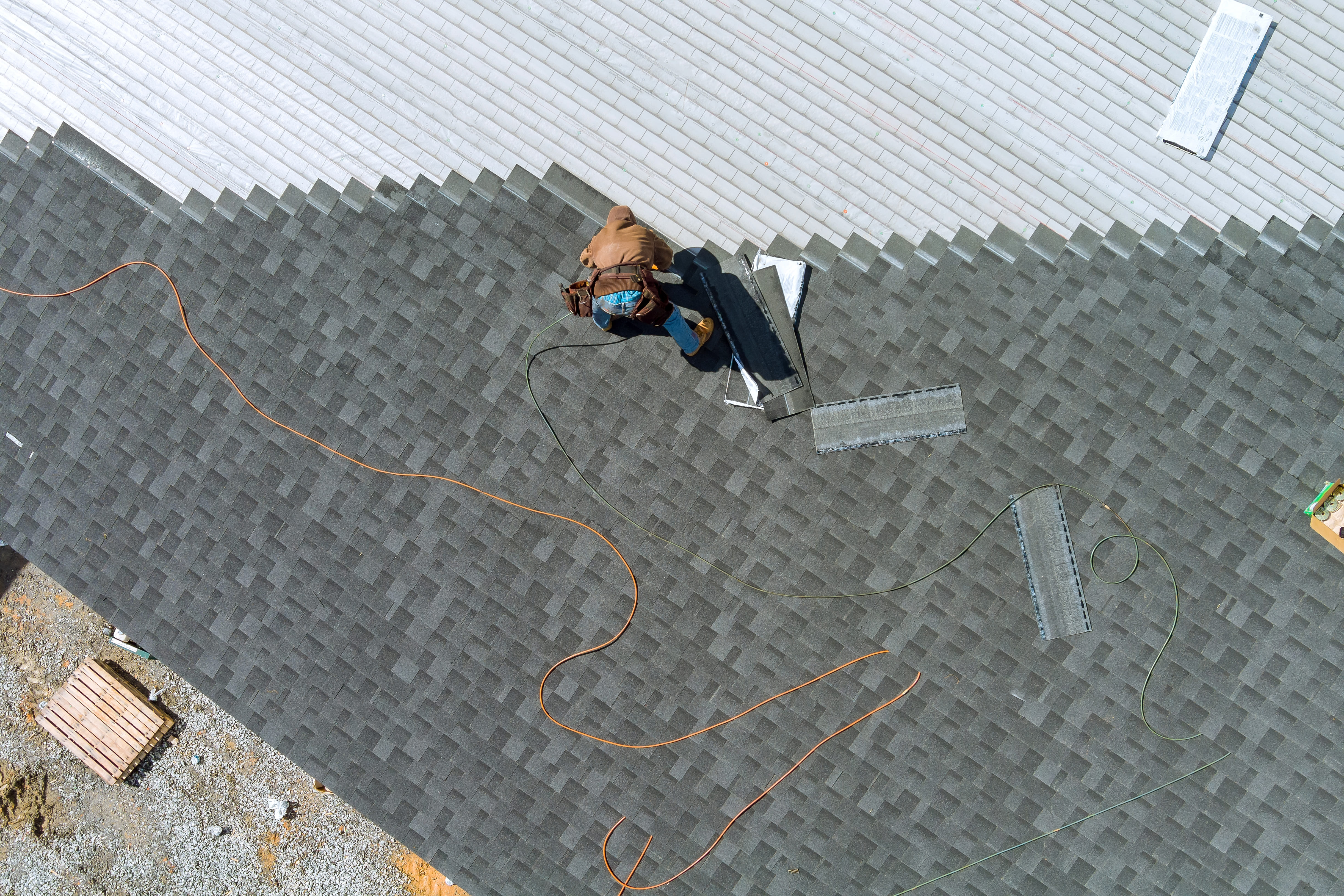 Aerial view of new roof installation in progress