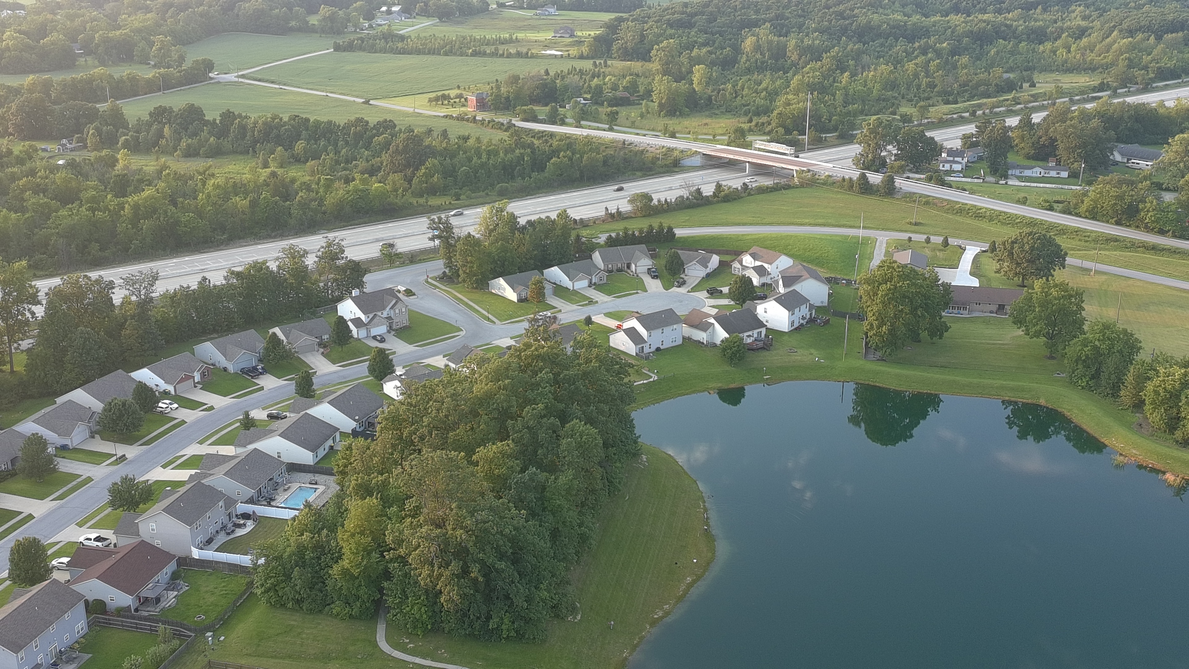 Personal aerial drone photo of a residential neighborhood near a lake