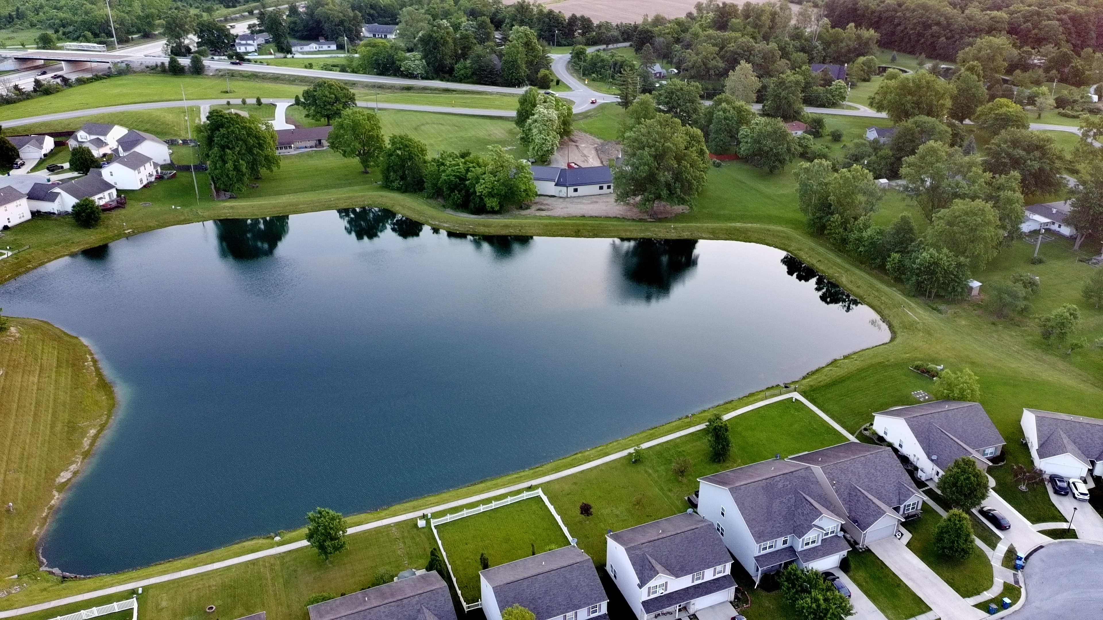 Personal aerial drone view of lakefront homes