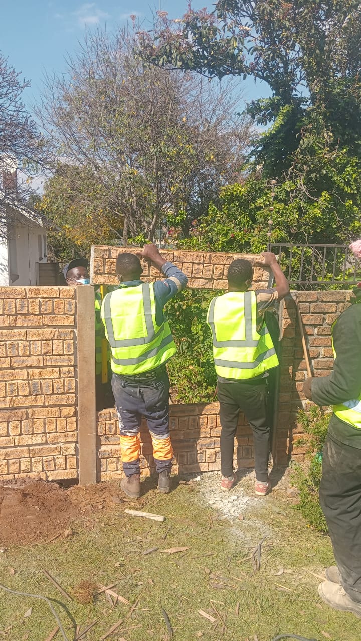 JMT team building a brick wall in Northcliff