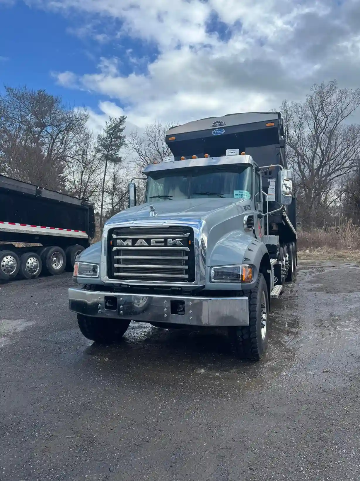 Large Mack truck with polished chrome and clean exterior after fleet mobile detailing service