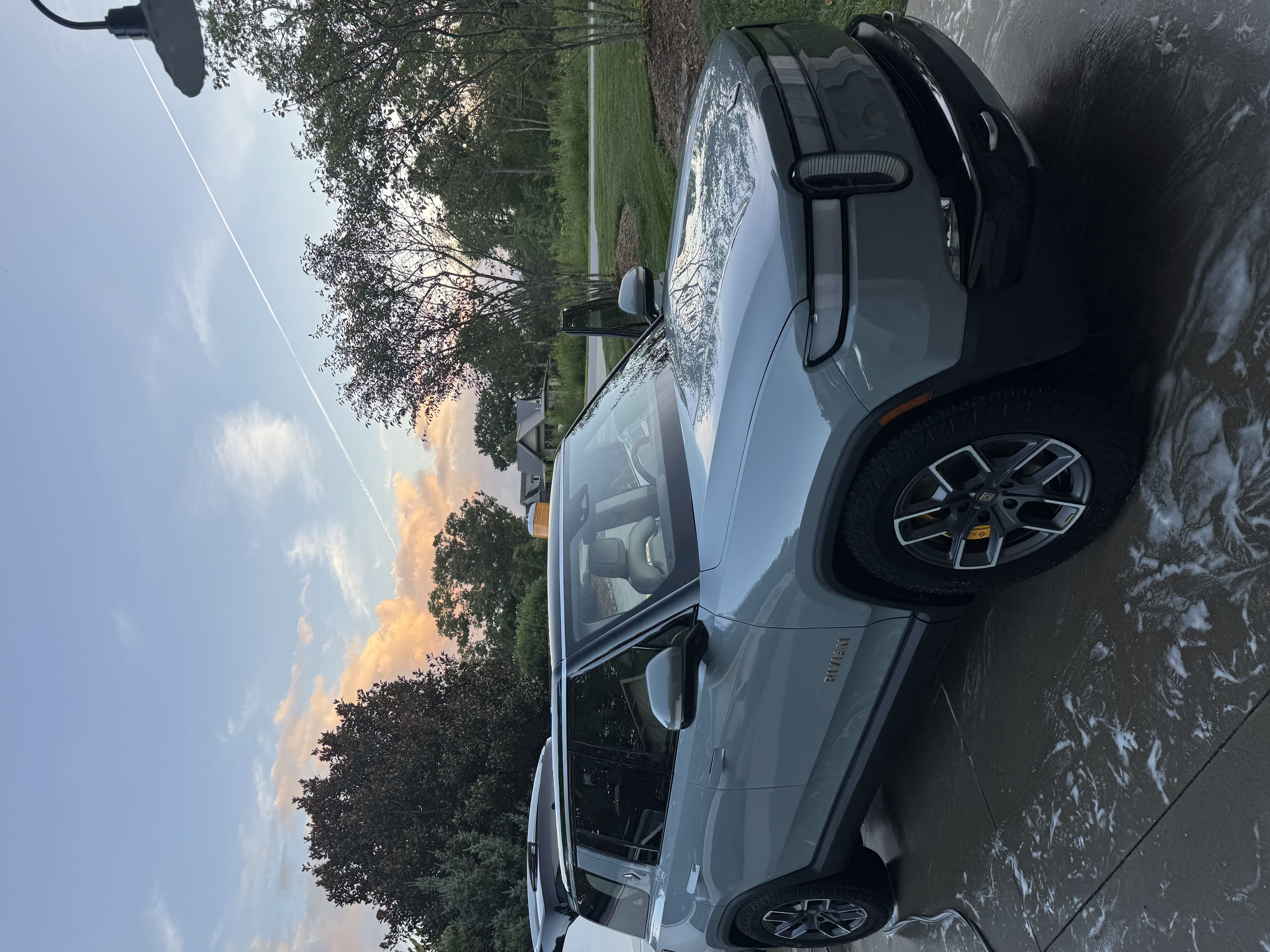 Rivian truck with glossy foam-washed exterior after professional mobile detailing by ELP AutoDetailing