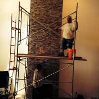 Mark Anthony Torres, owner of The Grout Guys of Bay Area, restoring tile on a job