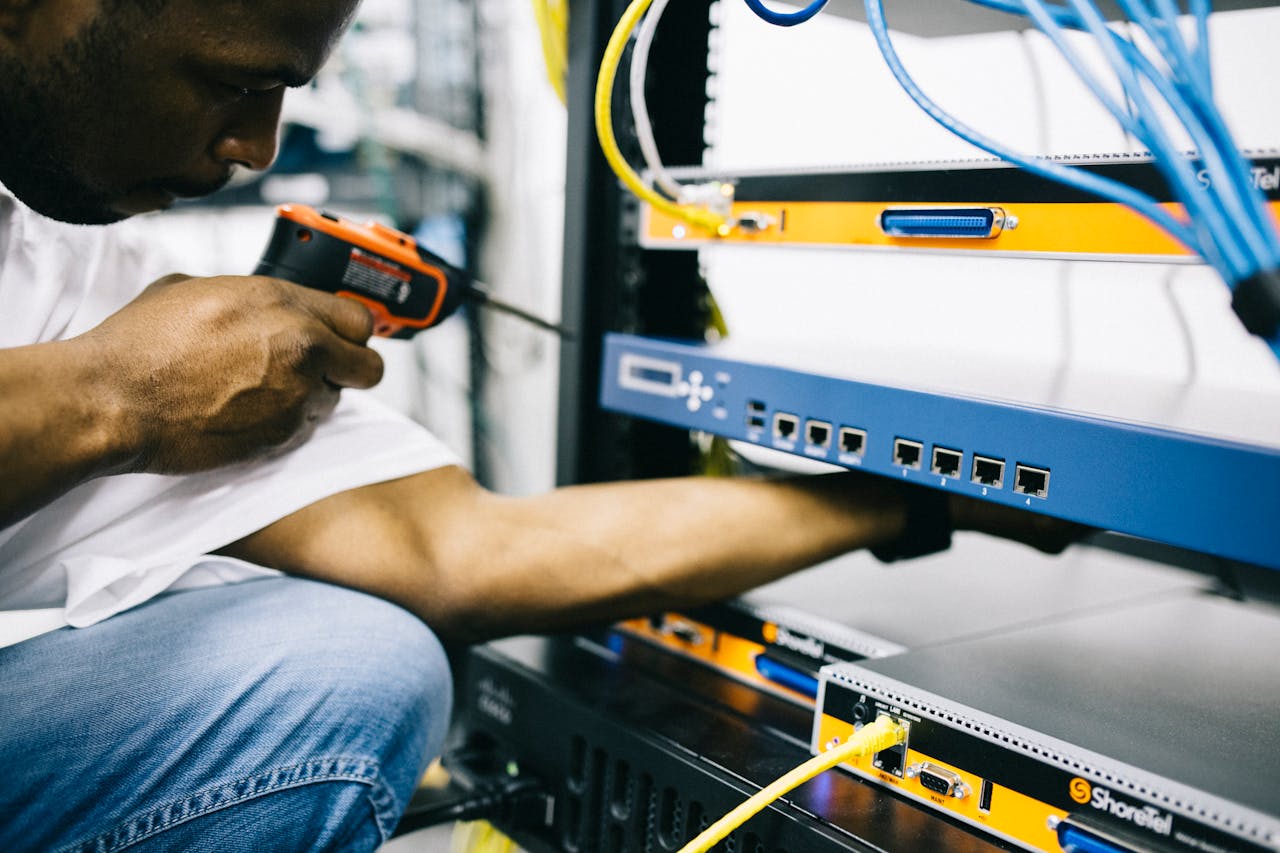 Graig LLC technician working on hardware repair
